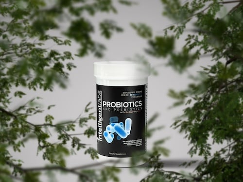bottle of adult probiotics with plants in background
